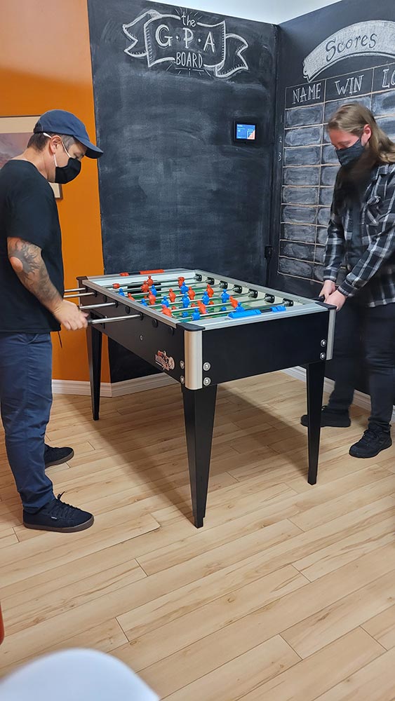 Ryan and Rob playing foosball